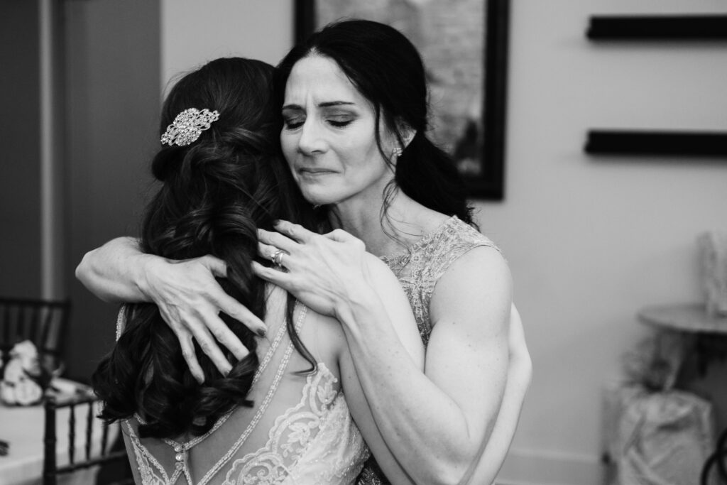 Navigating Family Drama while planning a wedding. Mom and Daughter share in a special dance during the reception that melts away the tension. 